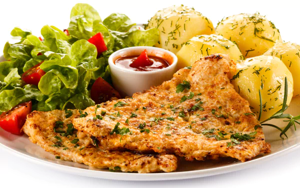 A 4K Ultra HD desktop wallpaper showing a meal with grilled meat, boiled potatoes topped with herbs, fresh salad, and a small bowl of ketchup on a white plate.