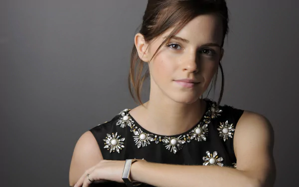 High-resolution 4K Ultra HD PC wallpaper featuring a close-up portrait of actress Emma Watson against a neutral gray background.