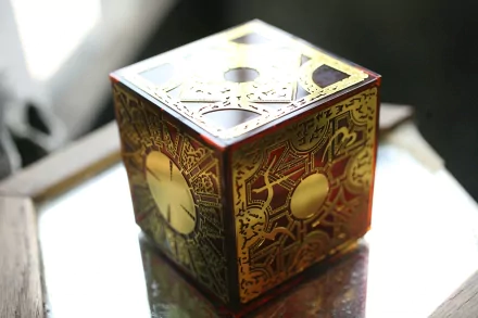 A richly detailed artistic box with intricate patterns and a glossy finish, set against a reflective surface, serves as a striking HD PC desktop wallpaper and background.