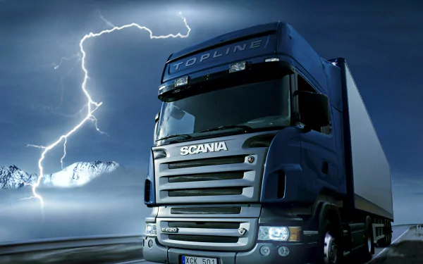 HD wallpaper featuring a Scania truck from Euro Truck Simulator 2, set against a dramatic backdrop of lightning and mountains. A striking and immersive gaming scene.