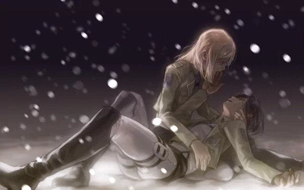A poignant scene from Attack on Titan featuring Historia Reiss and Ymir, both in uniform, with tears and snow creating a somber atmosphere as they lie together.