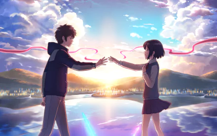 HD desktop wallpaper featuring Taki Tachibana and Mitsuha Miyamizu from the anime Your Name. The characters reach out towards each other against a stunning backdrop of a sunrise or sunset with vibrant clouds.