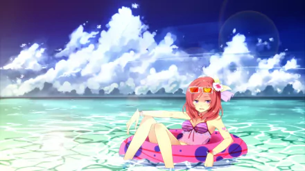 HD PC desktop wallpaper: Maki Nishikino (Love Live!) in a pink swimsuit, lounging on a donut float in clear shallow sea beneath a bright blue sky with billowing clouds.