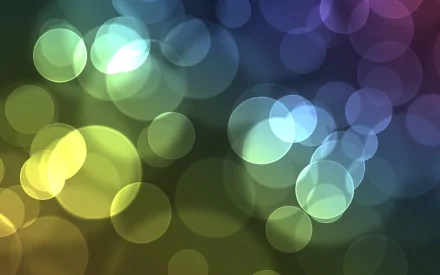 An abstract HD wallpaper featuring colorful circles that blend softly into each other, creating a vibrant and visually engaging background for desktop use.