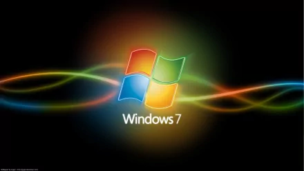 A vibrant HD PC desktop wallpaper featuring the Windows 7 logo, set against a dark background with flowing colorful lines that enhance the technology theme.