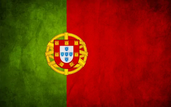 HD desktop wallpaper featuring the flag of Portugal, showcasing the vibrant green and red colors with the national coat of arms at the center.