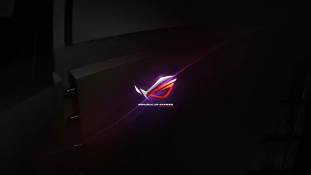 Dark-themed HD PC desktop wallpaper featuring the glowing Republic of Gamers (ROG) logo by Asus, highlighting cutting-edge technology and gaming aesthetics.