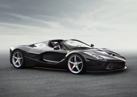 Black Ferrari LaFerrari Aperta roadster on asphalt under an overcast sky — 4K Ultra HD PC desktop wallpaper background showcasing the vehicle.