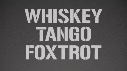 HD desktop wallpaper featuring bold white stencil text on a rough, dark background reading Whiskey Tango Foxtrot, a military phrase using the NATO phonetic alphabet.