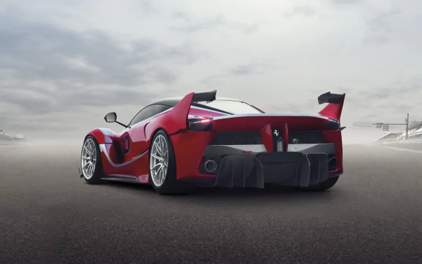 Red Ferrari FXX K racing car on a foggy track seen from the rear, high-detail 2K Quad HD PC desktop wallpaper/background.