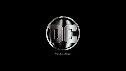 HD PC desktop wallpaper featuring the sleek, metallic DC Comics logo centered on a black background, representing the iconic comic brand.