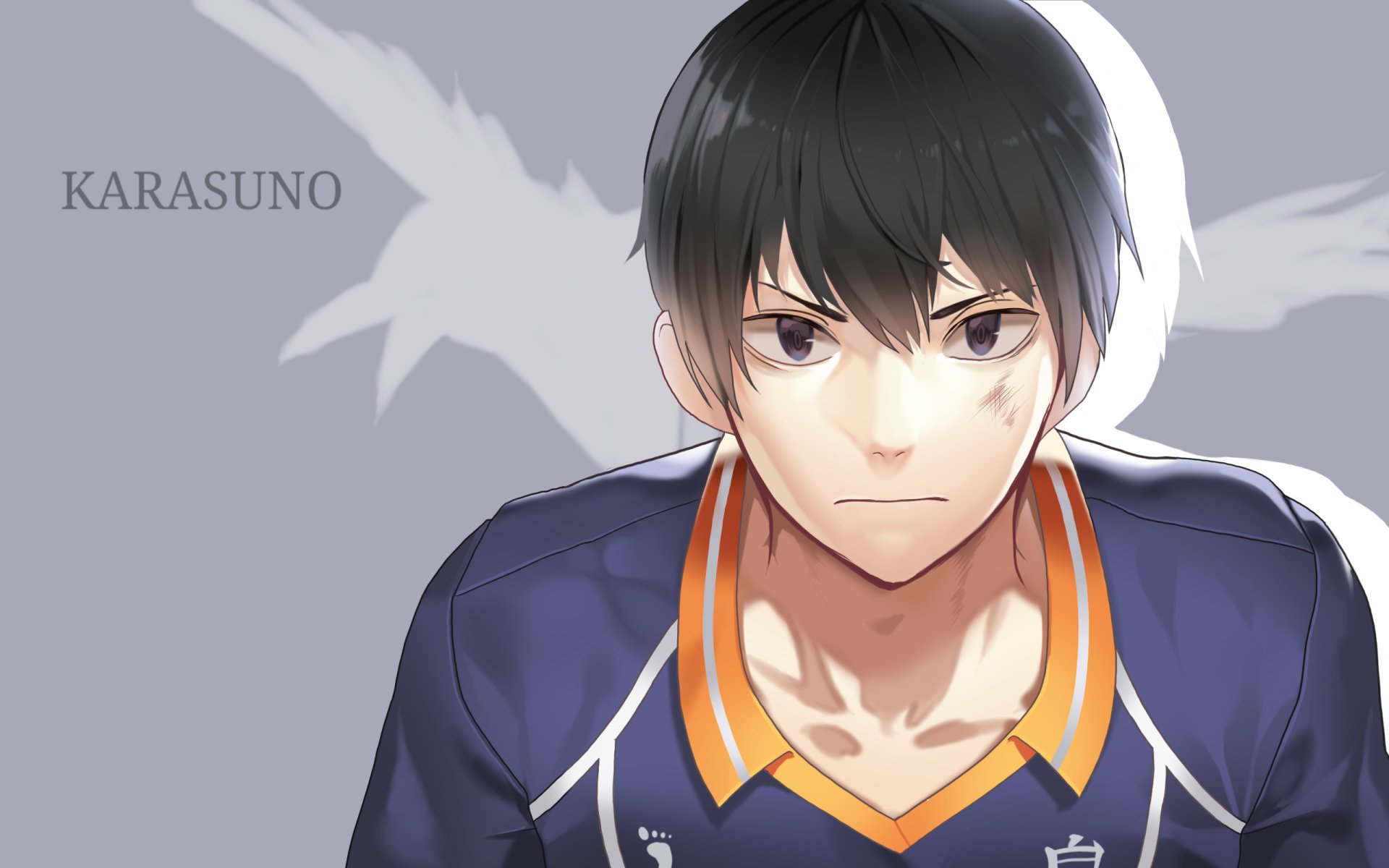 HD anime desktop wallpaper featuring Tobio Kageyama from Haikyū!! in his Karasuno volleyball uniform against a soft gray background.