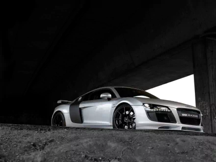 HD wallpaper of a sleek silver Audi R8 Razor parked under a bridge, highlighting its modern design and aerodynamic features.