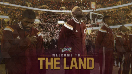 HD wallpaper featuring Cleveland Cavaliers players on the court with the text Welcome to THE LAND in the foreground.