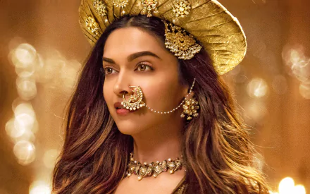 HD desktop wallpaper featuring Deepika Padukone in her iconic role from the movie Bajirao Mastani, adorned in traditional attire with intricate jewelry and a golden headpiece.