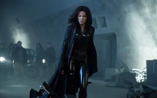 HD desktop wallpaper featuring Kate Beckinsale as Selene in Underworld: Blood Wars. Selene, clad in black leather, exudes determination amidst a dim, gritty setting.