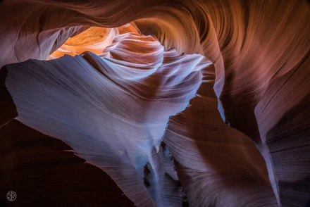 Antelope Canyon, Arizona — nature scene as an HD PC desktop wallpaper: sinuous sandstone walls and shafts of light in warm and cool hues.
