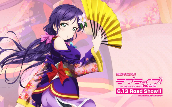 HD desktop wallpaper featuring Nozomi Tojo from the anime Love Live! She is depicted in a vibrant kimono, holding a yellow fan against a pastel background with text promoting the Love Live! movie.