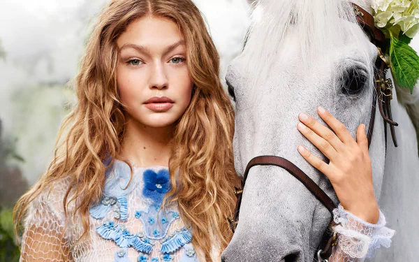 Gigi Hadid, blonde American model, poses closely with a white horse in this HD desktop wallpaper and background.