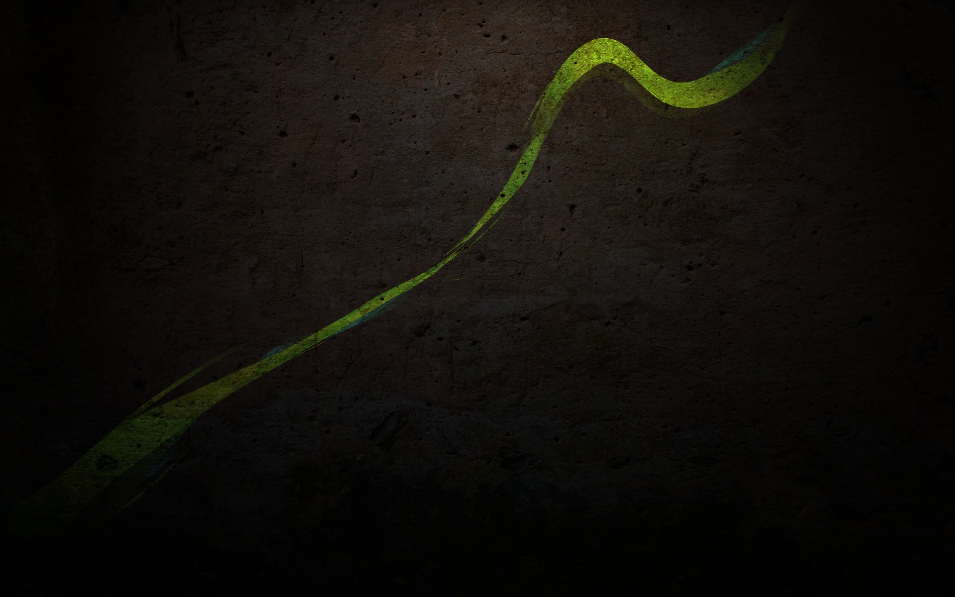A vibrant green graffiti swirl dances across a dark textured background, creating an eye-catching artistic wallpaper for PC desktops.