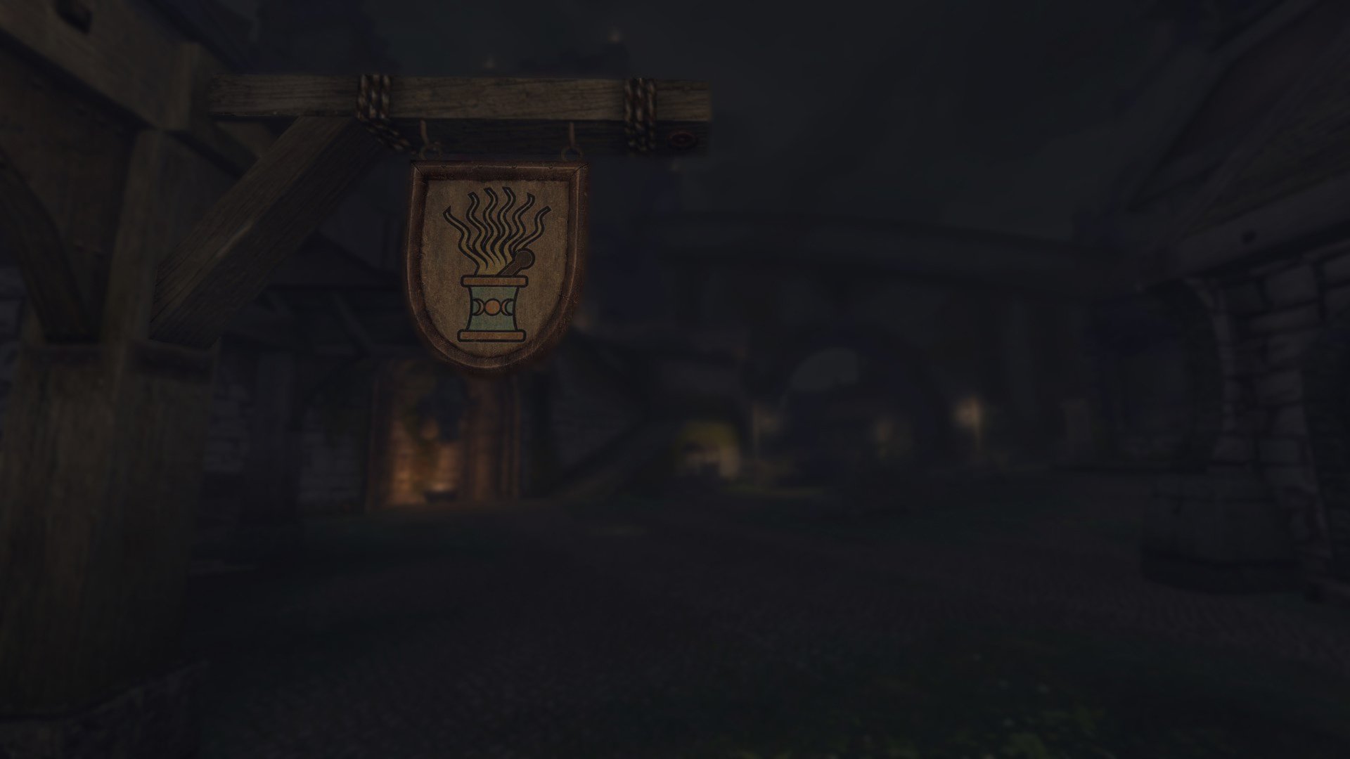 HD PC desktop wallpaper showcasing a dark tavern scene from The Elder Scrolls V: Skyrim, capturing the game's immersive medieval fantasy atmosphere.