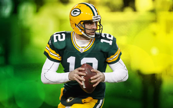 HD desktop wallpaper featuring a focused football player in a green and gold Green Bay Packers uniform with the number 12, set against a vibrant blurred stadium background.
