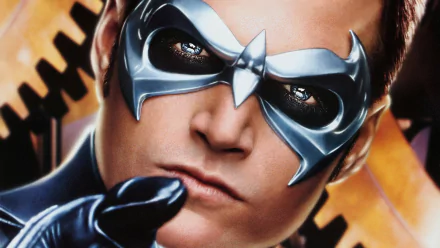 HD wallpaper of Nightwing, featuring Dick Grayson, from the movie Batman & Robin. The character is depicted in a striking pose with a focused expression and iconic mask.