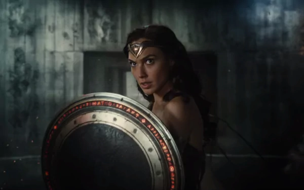 HD desktop wallpaper featuring Gal Gadot as Diana Prince, also known as Wonder Woman, from the movie Justice League, holding a shield in a dramatic scene.