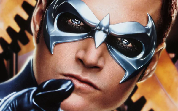 HD wallpaper of Nightwing, featuring Dick Grayson, from the movie Batman & Robin. The character is depicted in a striking pose with a focused expression and iconic mask.