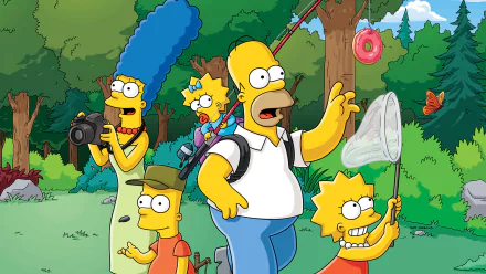 The Simpsons family – Lisa, Maggie, Bart, Marge, and Homer – enjoy an outdoor adventure in this HD desktop wallpaper. The image captures Marge with a camera, Homer fishing, and Lisa with a butterfly net.
