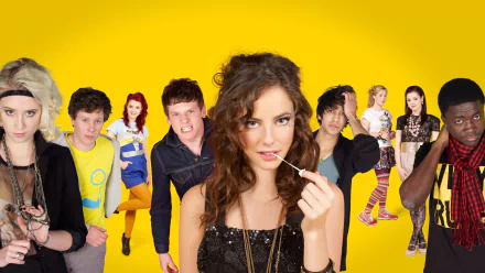 HD desktop wallpaper featuring the main cast of the TV show Skins (2007) set against a vibrant yellow background.