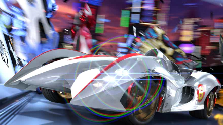 HD PC desktop wallpaper: Speed Racer movie scene — sleek white racecar streaks through a neon cityscape with riders and vivid motion-blur light trails.