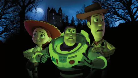 HD PC desktop wallpaper/background from the movie Toy Story of Terror!: Jessie, Buzz Lightyear and Woody glow green and look frightened against a moonlit, castle-lined night.