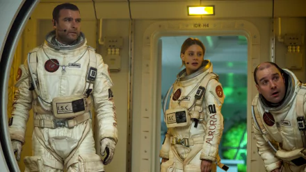 HD desktop wallpaper featuring astronauts from the movie The Last Days On Mars inside a spacecraft, dressed in detailed space suits.