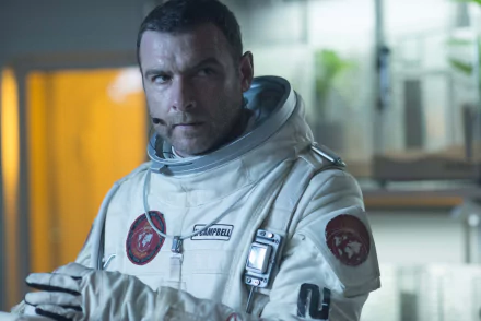 HD desktop wallpaper featuring an astronaut from the movie The Last Days On Mars, set in a sci-fi environment with detailed space suit and intense expression.