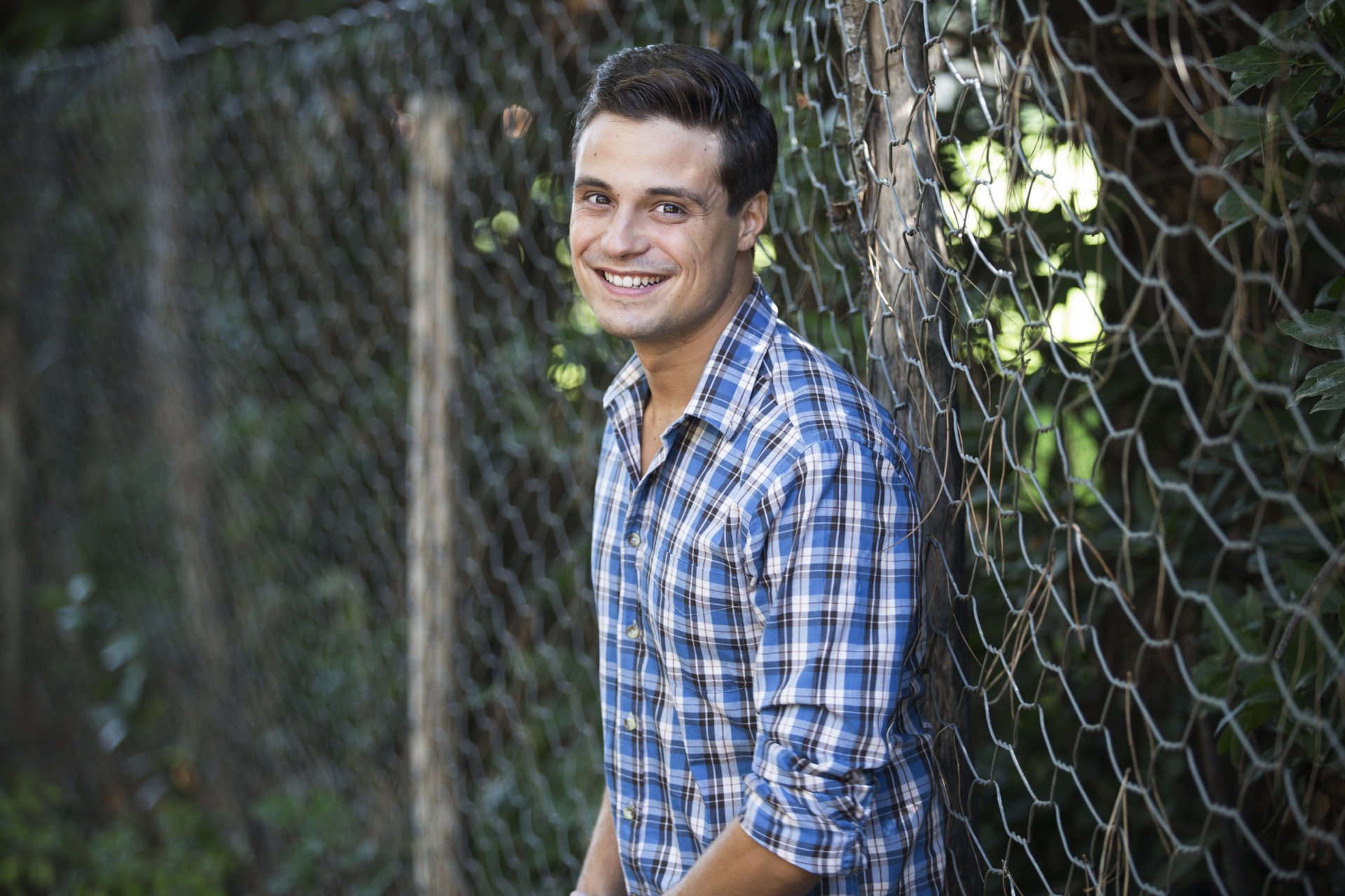 Download Fence Brown Eyes Smile Man Model 4k Ultra HD Wallpaper by Riccardo Riande