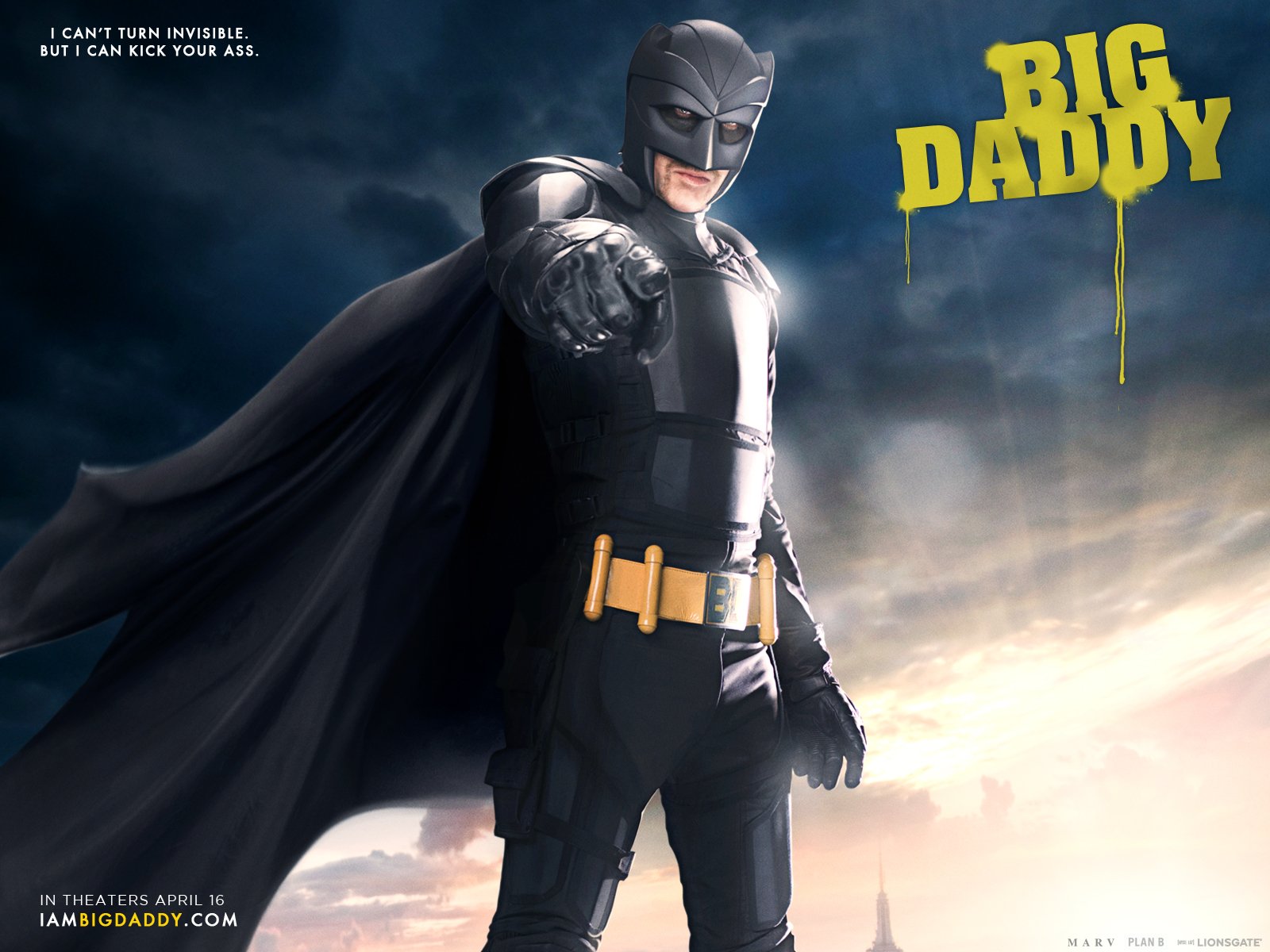 HD desktop wallpaper featuring the character Big Daddy from the movie Kick-Ass, clad in black armor and cape against a dramatic sky backdrop.
