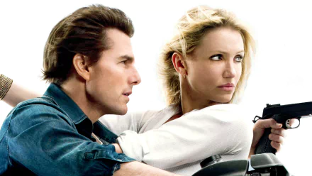 HD desktop wallpaper: promotional shot from the movie Knight and Day showing two actors — a woman aiming a handgun and a man beside her, both looking tense.