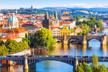 A vibrant 4K Ultra HD view of Prague, Czech Republic, showcasing historic buildings, bridges crossing the Vltava River, and the city's scenic urban landscape.