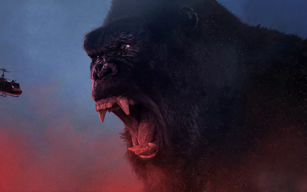 4K Ultra HD desktop wallpaper featuring a roaring gorilla from the movie Kong: Skull Island against a dark, smoky background with a helicopter nearby.