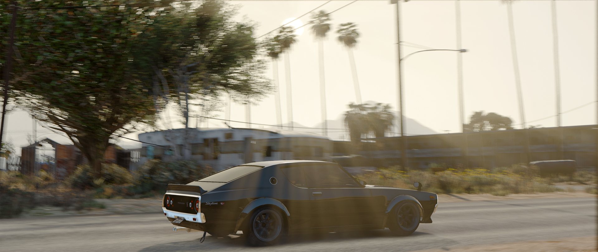 HD PC desktop wallpaper featuring a sleek car speeding through a sunlit urban environment from the video game Grand Theft Auto V.