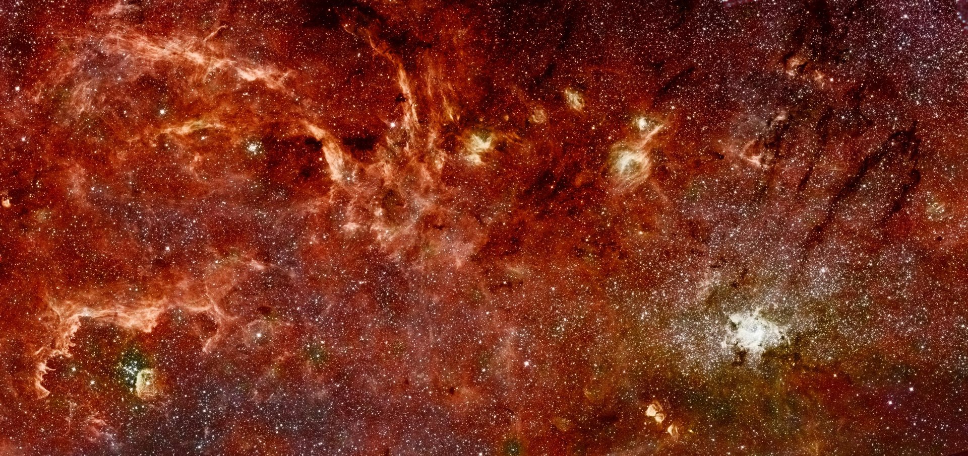 A stunning HD PC desktop wallpaper depicting a vibrant sci-fi space scene, rich in deep reds and star-filled expanses, evoking the mystery of the universe.