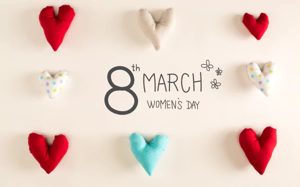 4K Ultra HD wallpaper featuring colorful fabric hearts surrounding 8th March Women's Day text, celebrating the holiday with a soft and festive design.