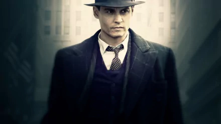 HD desktop wallpaper featuring Johnny Depp in character from the movie Public Enemies, dressed in 1930s attire with a fedora and suit.