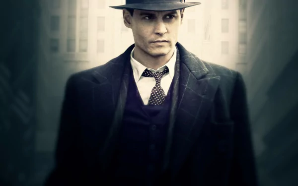 HD desktop wallpaper featuring Johnny Depp in character from the movie Public Enemies, dressed in 1930s attire with a fedora and suit.