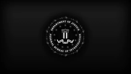 HD desktop wallpaper featuring the FBI emblem on a sleek black background.