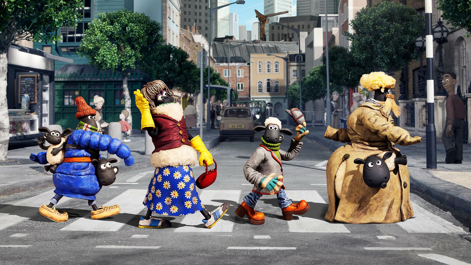 HD PC desktop wallpaper featuring characters from Shaun the Sheep Movie crossing a city street in a playful, animated scene.