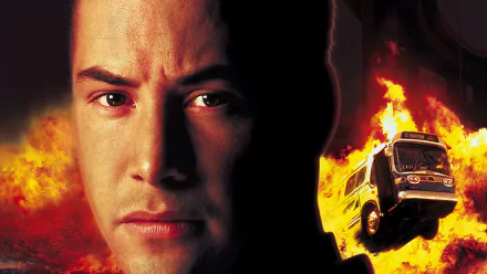 HD desktop wallpaper featuring Keanu Reeves from the movie Speed, with an intense close-up and an exploding bus in the background.
