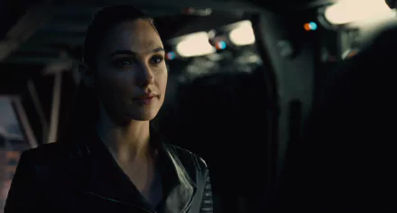 HD desktop wallpaper featuring Gal Gadot as Diana Prince/Wonder Woman from the Justice League movie, set in a dimly lit, intense scene.