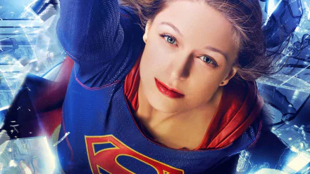 A high-definition desktop wallpaper featuring Melissa Benoist as Supergirl from the TV show Supergirl. The image showcases Supergirl in her iconic suit, appearing strong and determined amidst a dynamic background.